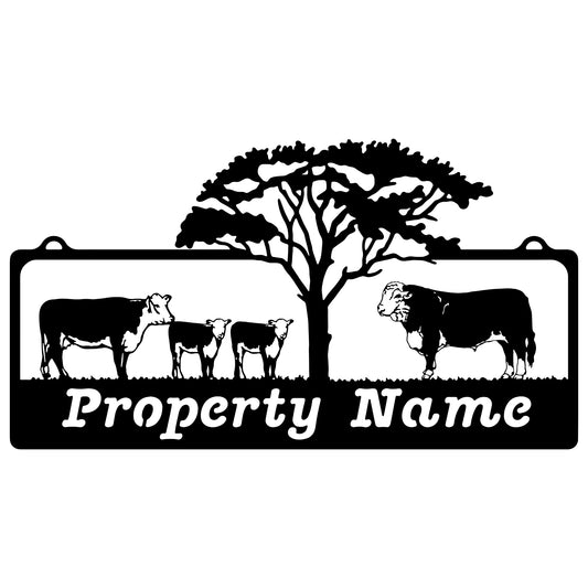 Bull, Cow, Calves with Tree Farm Sign